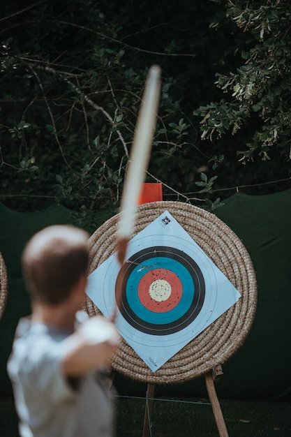 cocreact_aim_for+insights_man_with_bow_aims